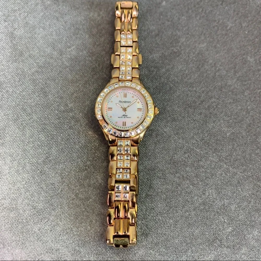 Armitron Now Gold-tone round mother of pearl face Quartz Watch